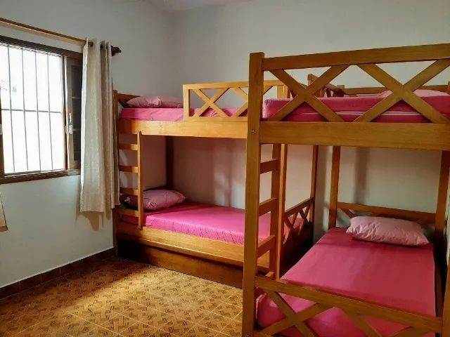 Casa em Guarujá, 04 dormitórios, localizada a uma quadra da praia - Foto 9