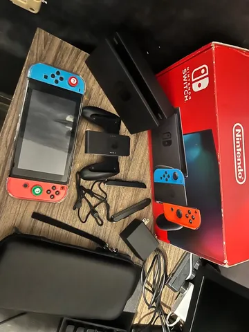 Nintendo, Video Game, Nintendo Switch Lite, Console Portátil, Tela de 5,5  Polegadas, Leve e Compacto, 32GB de Armazenamento, Controles Embutidos,  Bateria de até 7 horas, Compatível com Jogos do Nintendo Switch, Coral