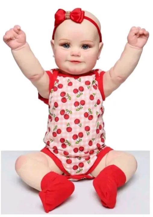 Boneca Reborn Nova 55cm 1.5 kg com acessórios  - Foto 5