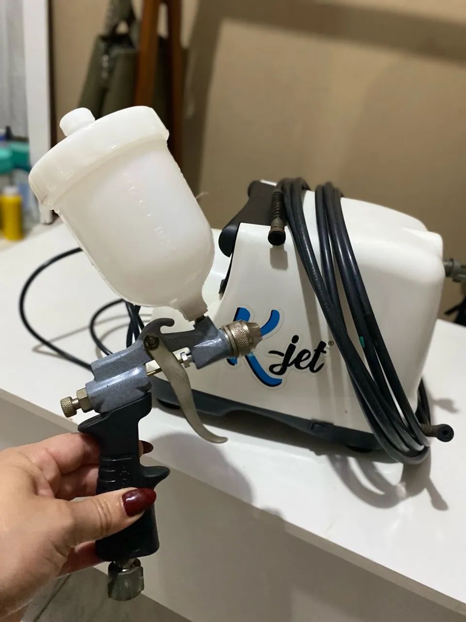 Pistola de pintura e compressor