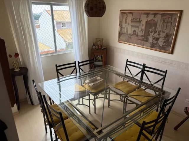 Mesa de jantar em aço e vidro temperado