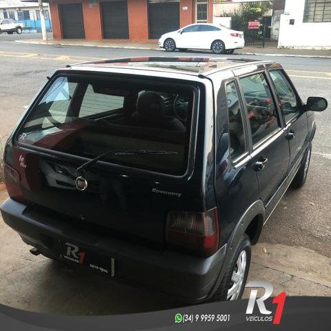 Fiat Uno Mille Celeb. Way Econ. 1.0 Manual Flex 2013 - Foto 4