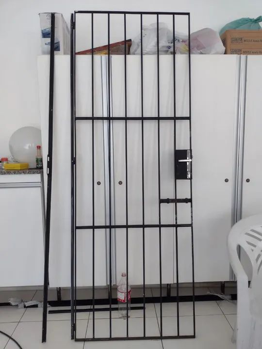 Porta de grade de ferro