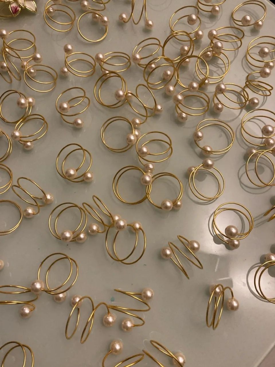 Anéis porta guardanapo Dourados com Pérolas