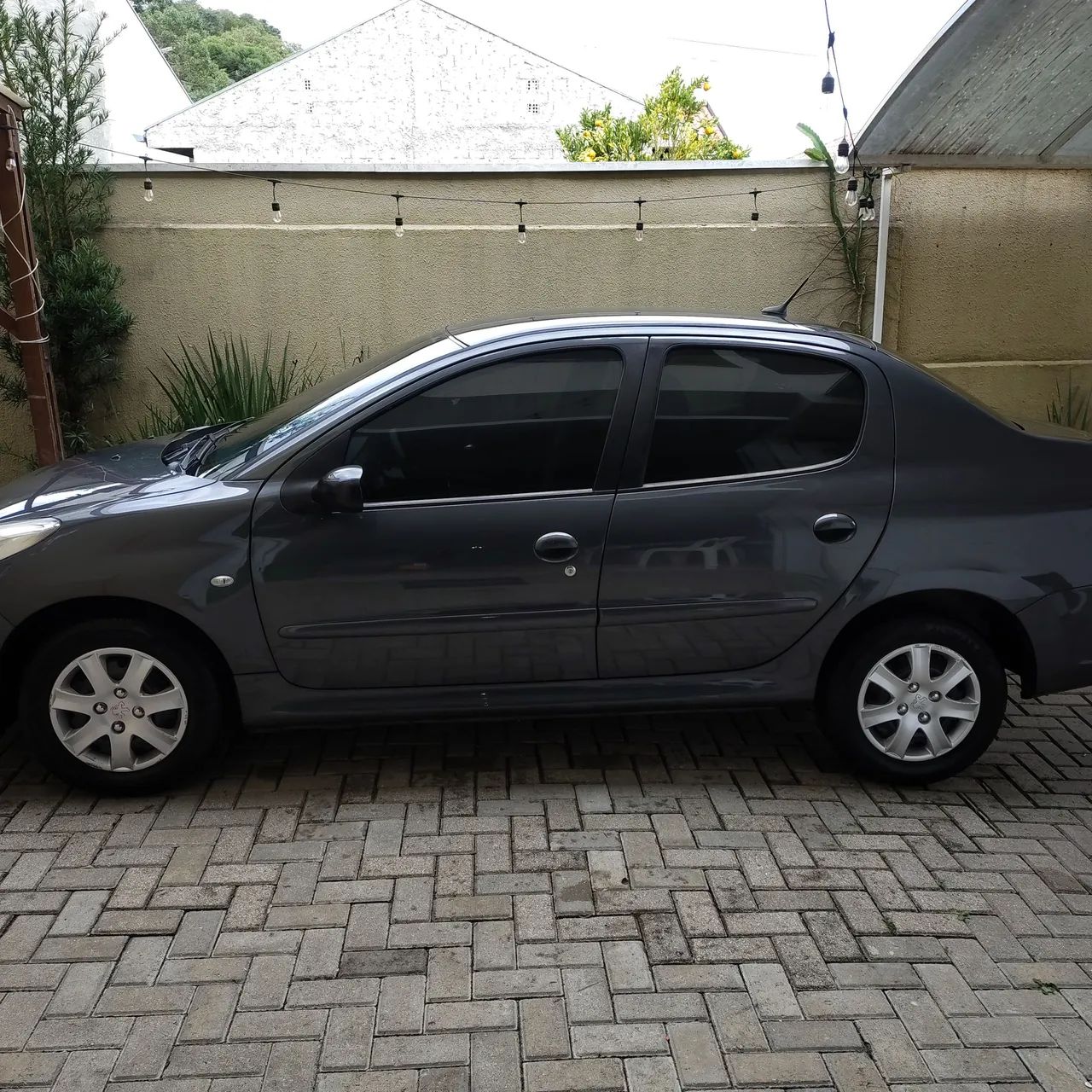 Peugeot 207 Sedan Passion XR 1.4 Flex 8V 4P 2010 - Foto 11