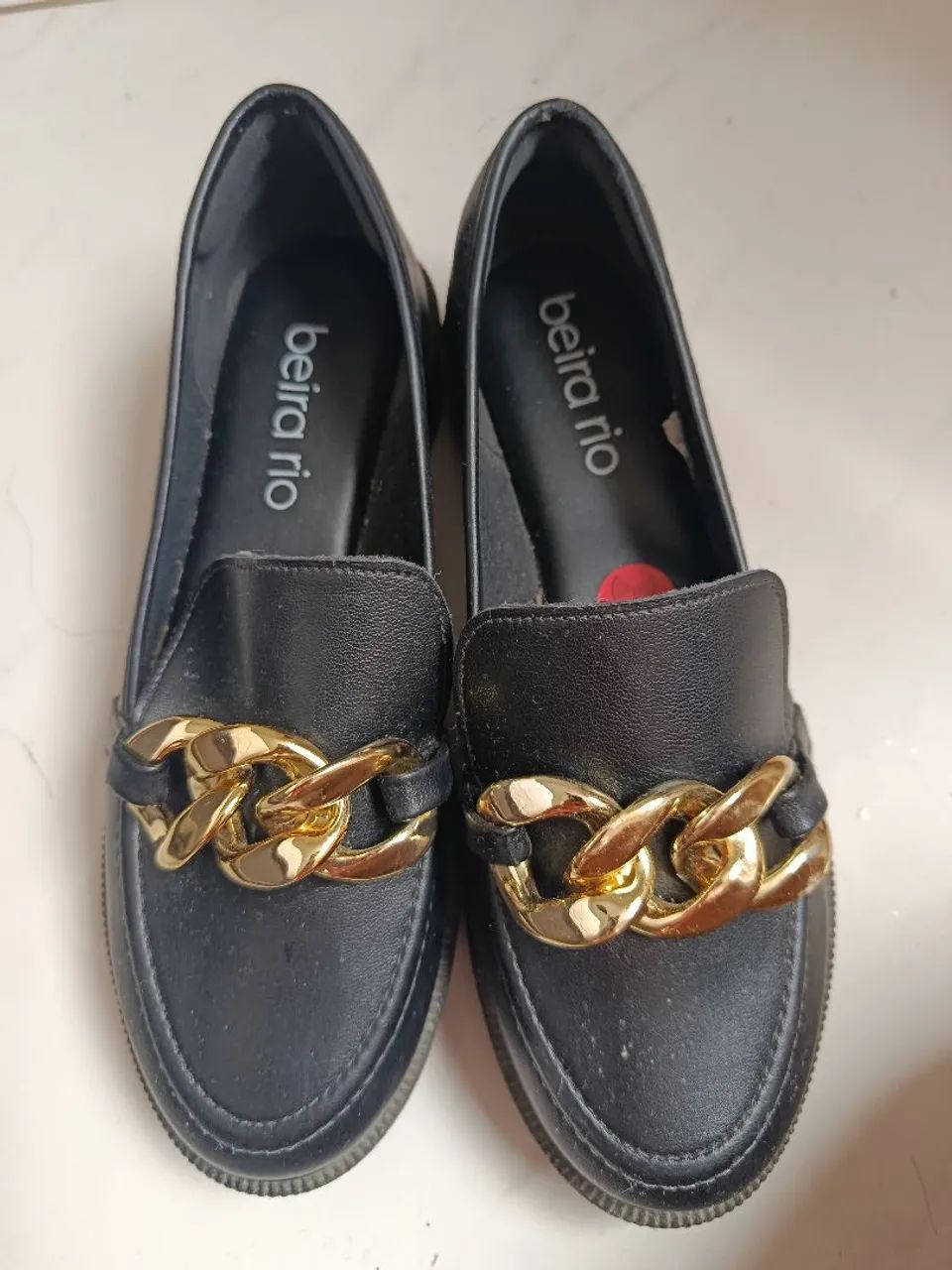Mocassim preto beira rio 