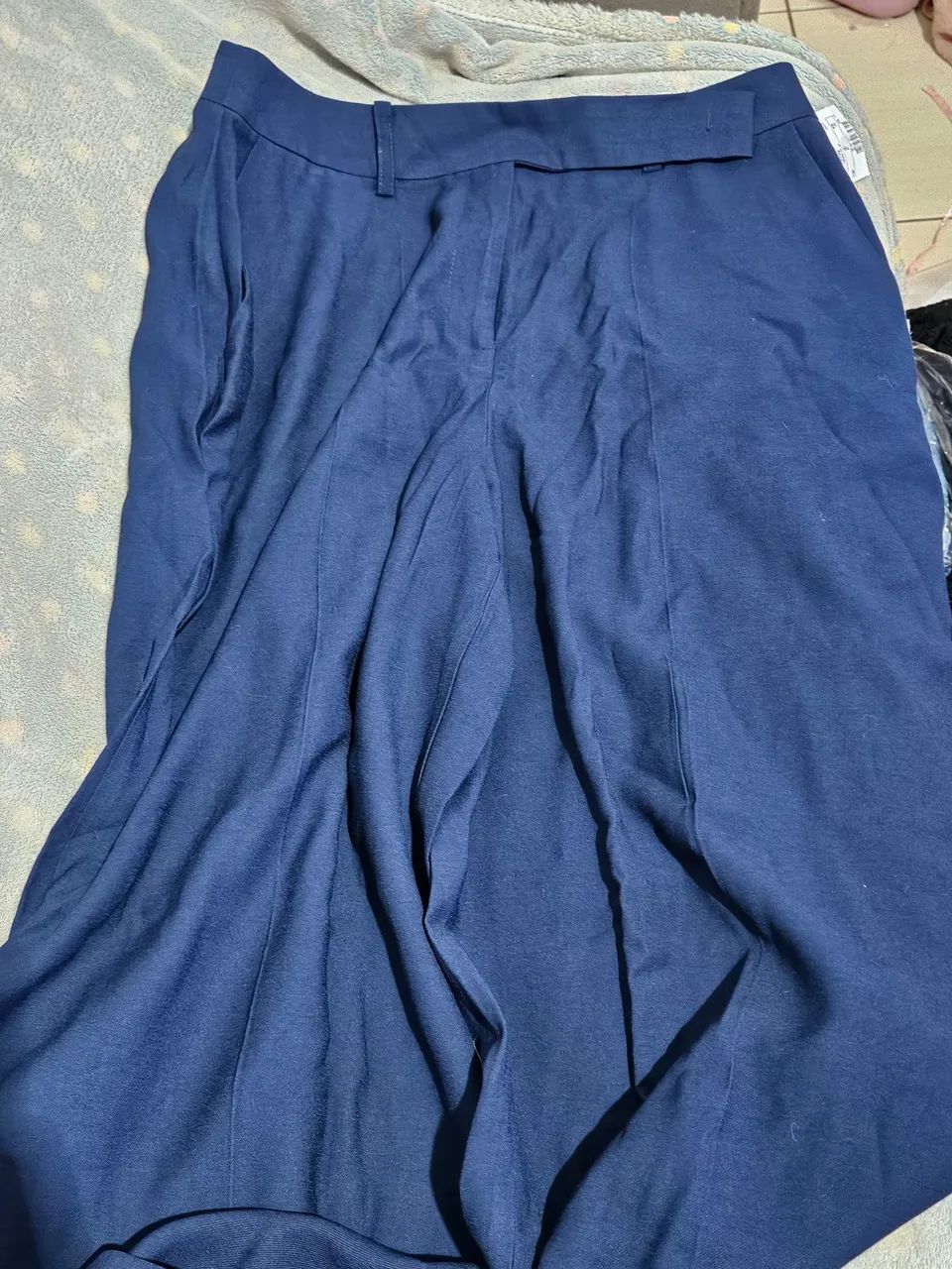 calça azul da cortelle