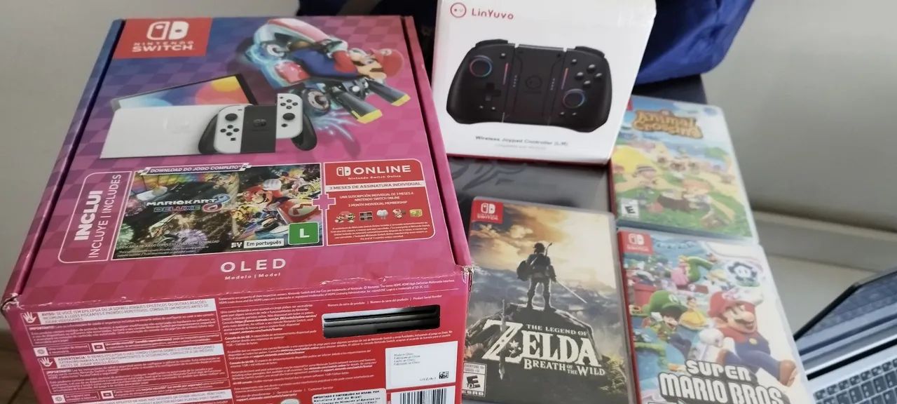 Nintendo Switch OLED + jogos e acessórios 