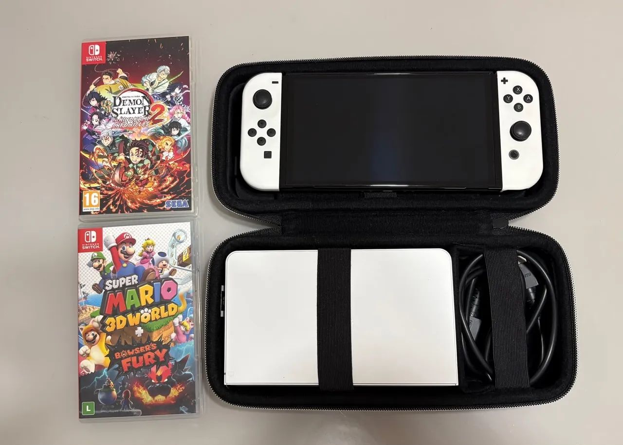 ? Nintendo Switch OLED Branco + 2 Jogos + Maleta - Foto 3