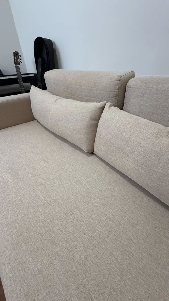 Sofá-cama de linho bege