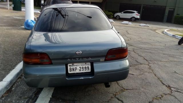 Nissan Altima 1993 2.4 16v - Foto 7