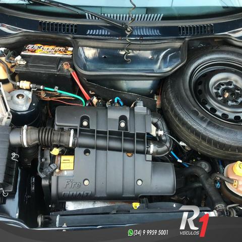 Fiat Uno Mille Celeb. Way Econ. 1.0 Manual Flex 2013 - Foto 8