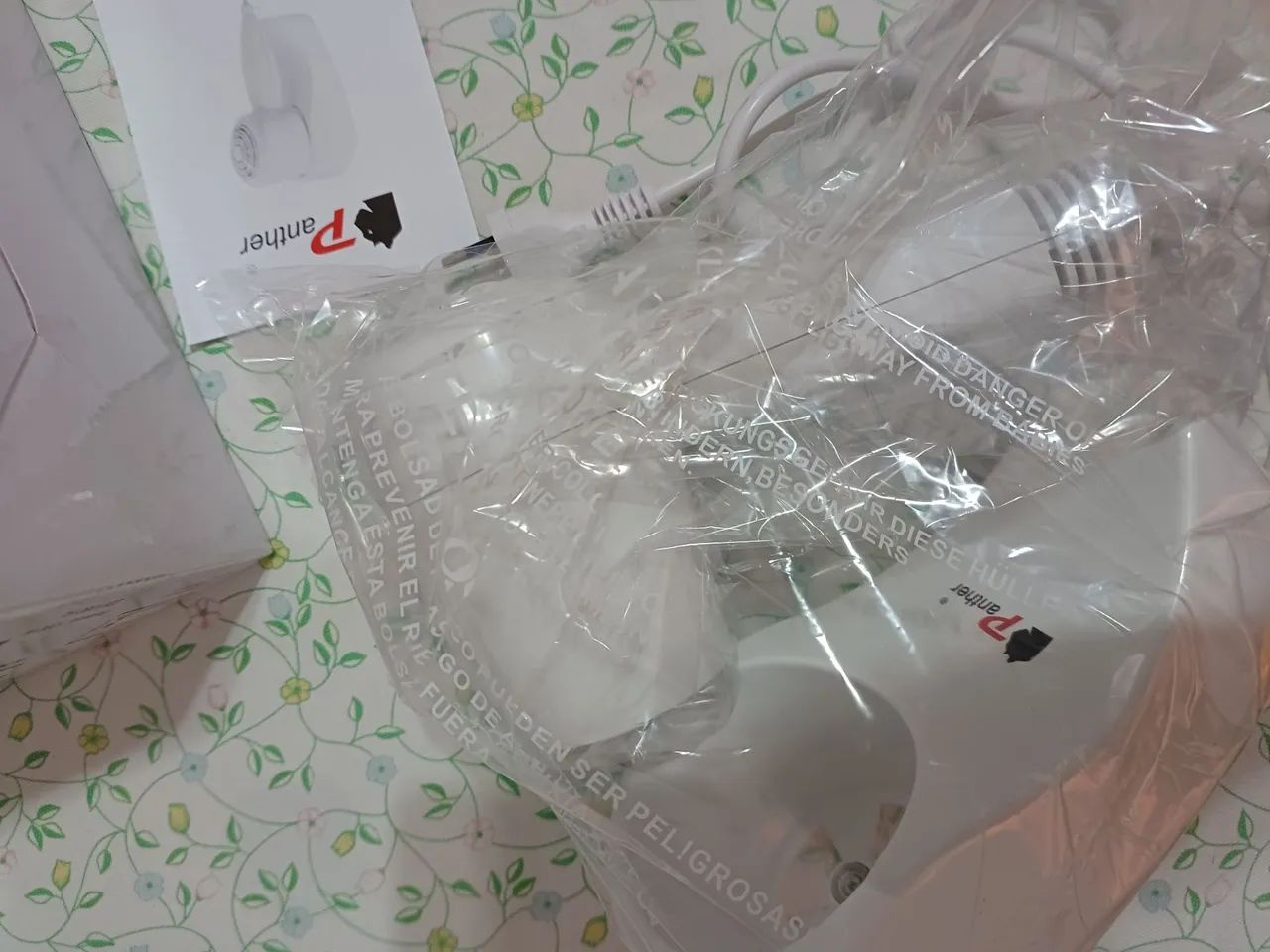 Secador de cabelo de hotel.