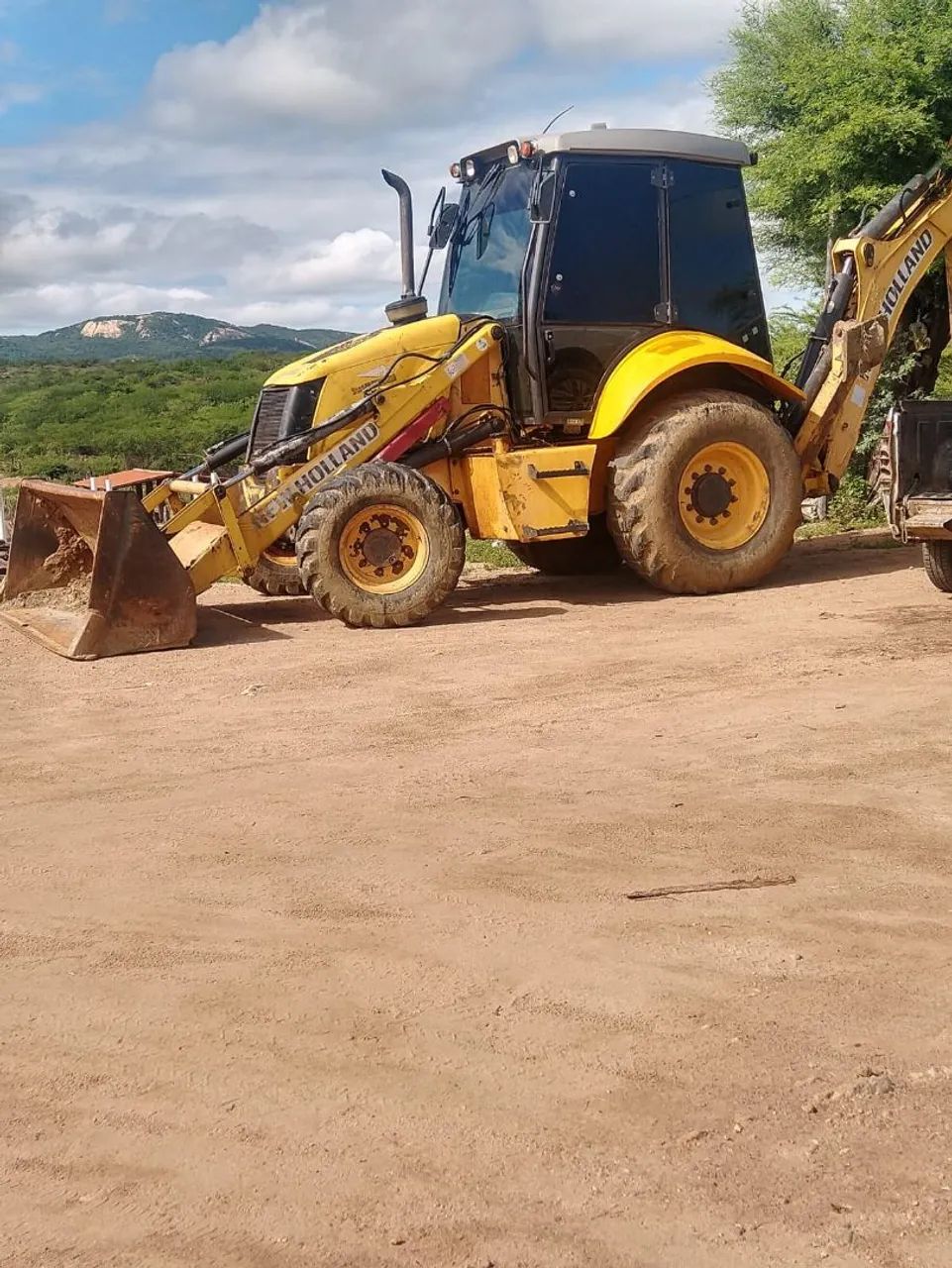 Retroescavadeira -  New Holland