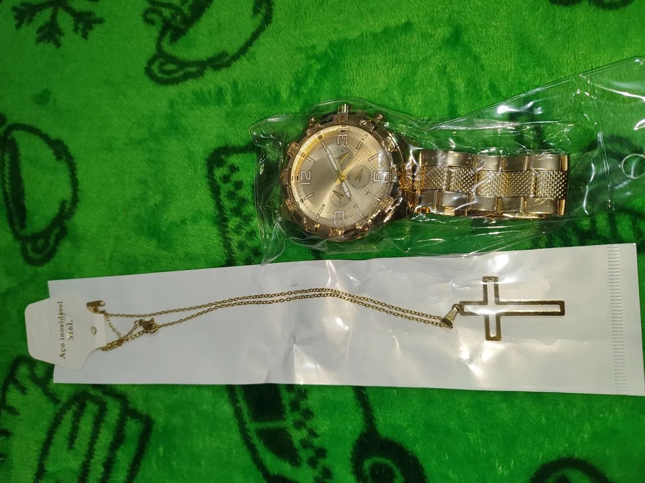 KIT RELÓGIO E CORDÃO . OS DOIS SÃO AÇO INOXIDÁVEIS . RELÓGIO À PROVA D'ÁGUA