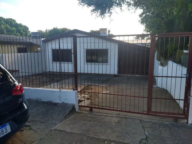 Casas com área de serviço à venda em Santa Cecilia, Viamão, RS - ZAP Imóveis