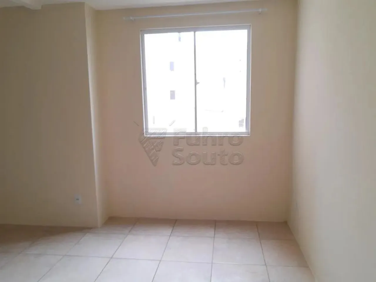 Apartamento aconchegante no bairro Areal, com garagem e dois quartos.