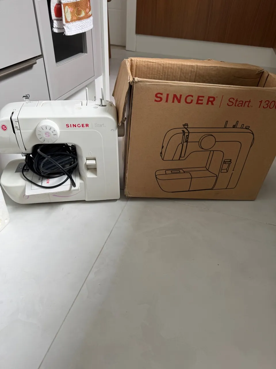 Máquina Singer start usada