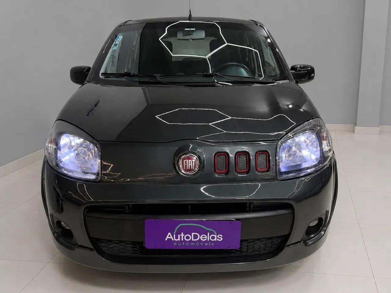 Fiat Uno Sporting 1.4 EVO Fire Flex 8V 4P 2012 - Foto 3