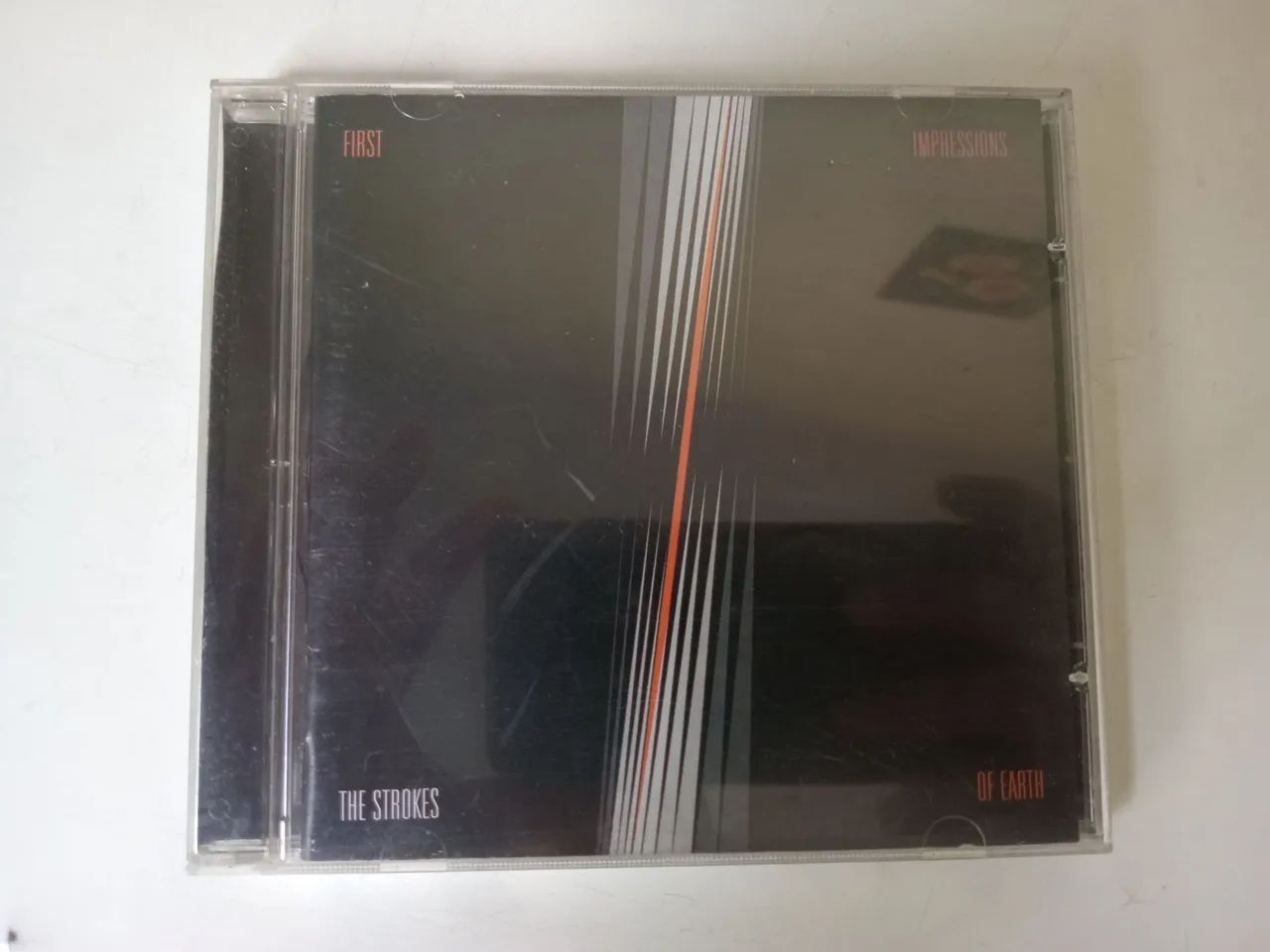 CD STROKES FIRST IMPRESSIONS OF EARTH 