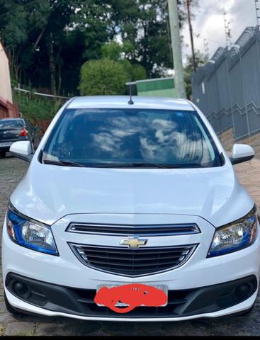 Ônix 2013 carro top . completo menos ar . 17.000 assume financiamento aceito moto