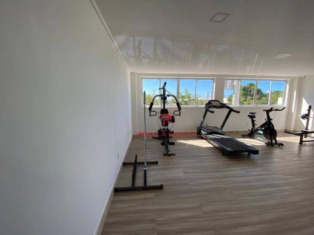 Apartamento novo, 2 quartos, andar alto, varanda gourmet e 2 vagas de garagem - Foto 6