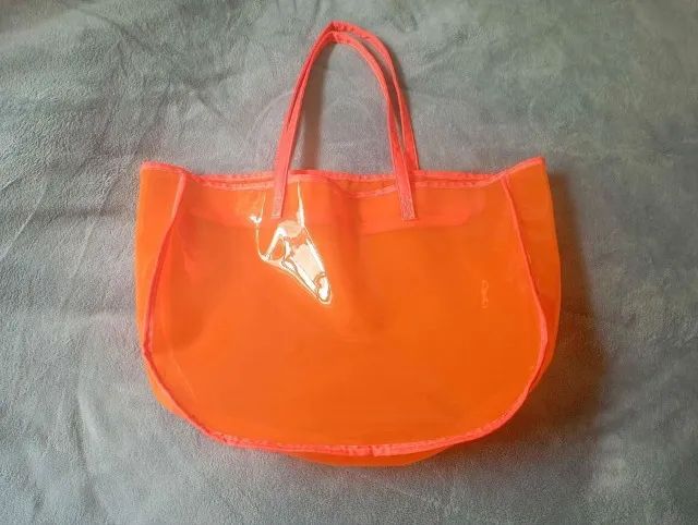 Bolsa de praia laranja fluorescente