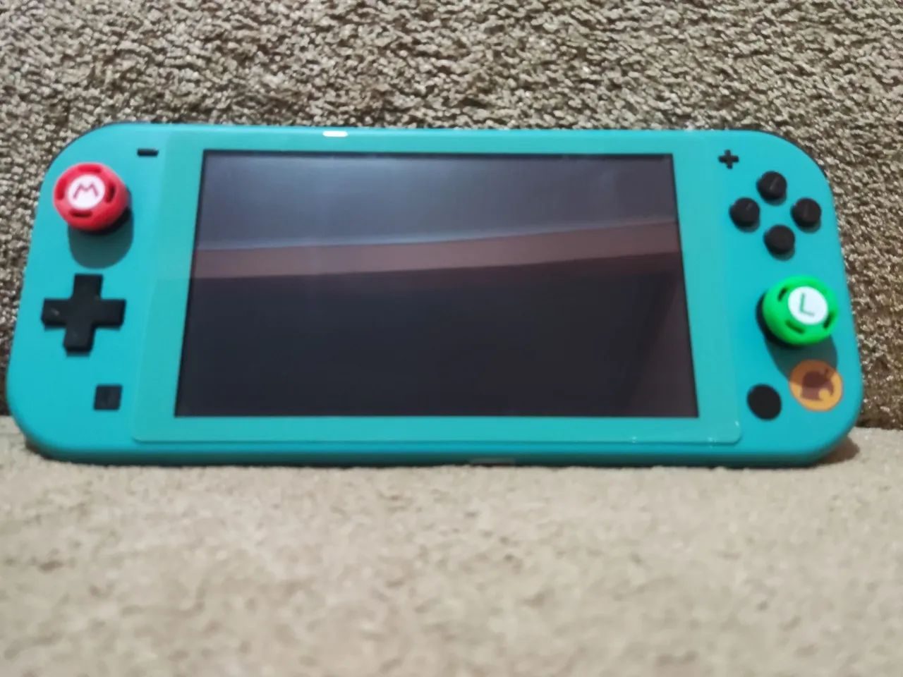 Nintendo Switch Lite desbloqueado, com analógicos Hall effect