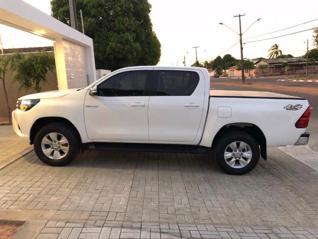 Toyota Hilux SRV 4x4, diesel, automática, 17/17, branca - Foto 5
