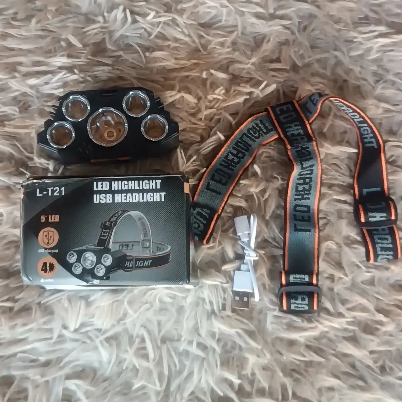 Lanterna de cabeça nova na caixa 