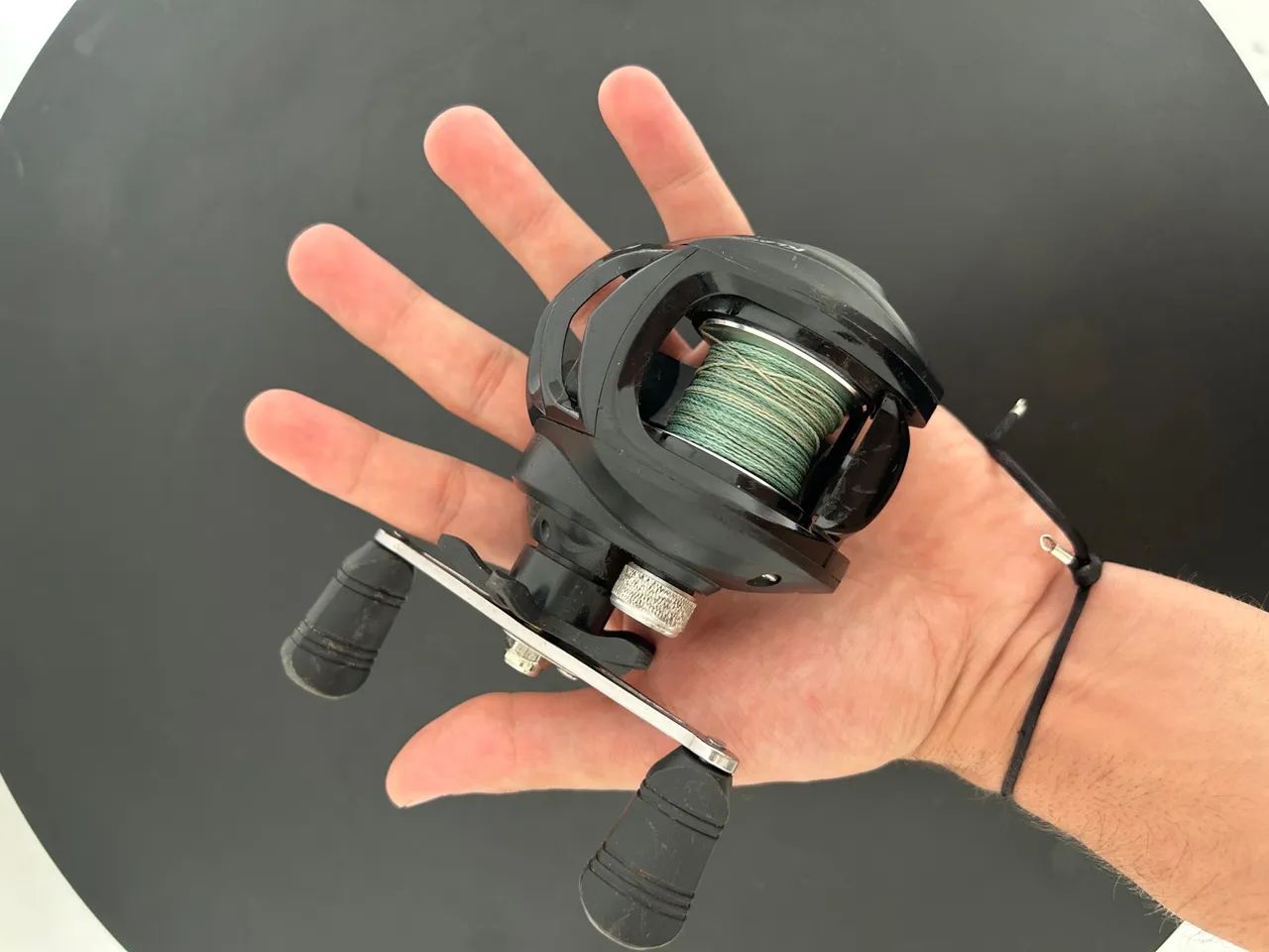 Carretilha top fishing + carretel cheio de linha multifilamento X4 - Foto 5