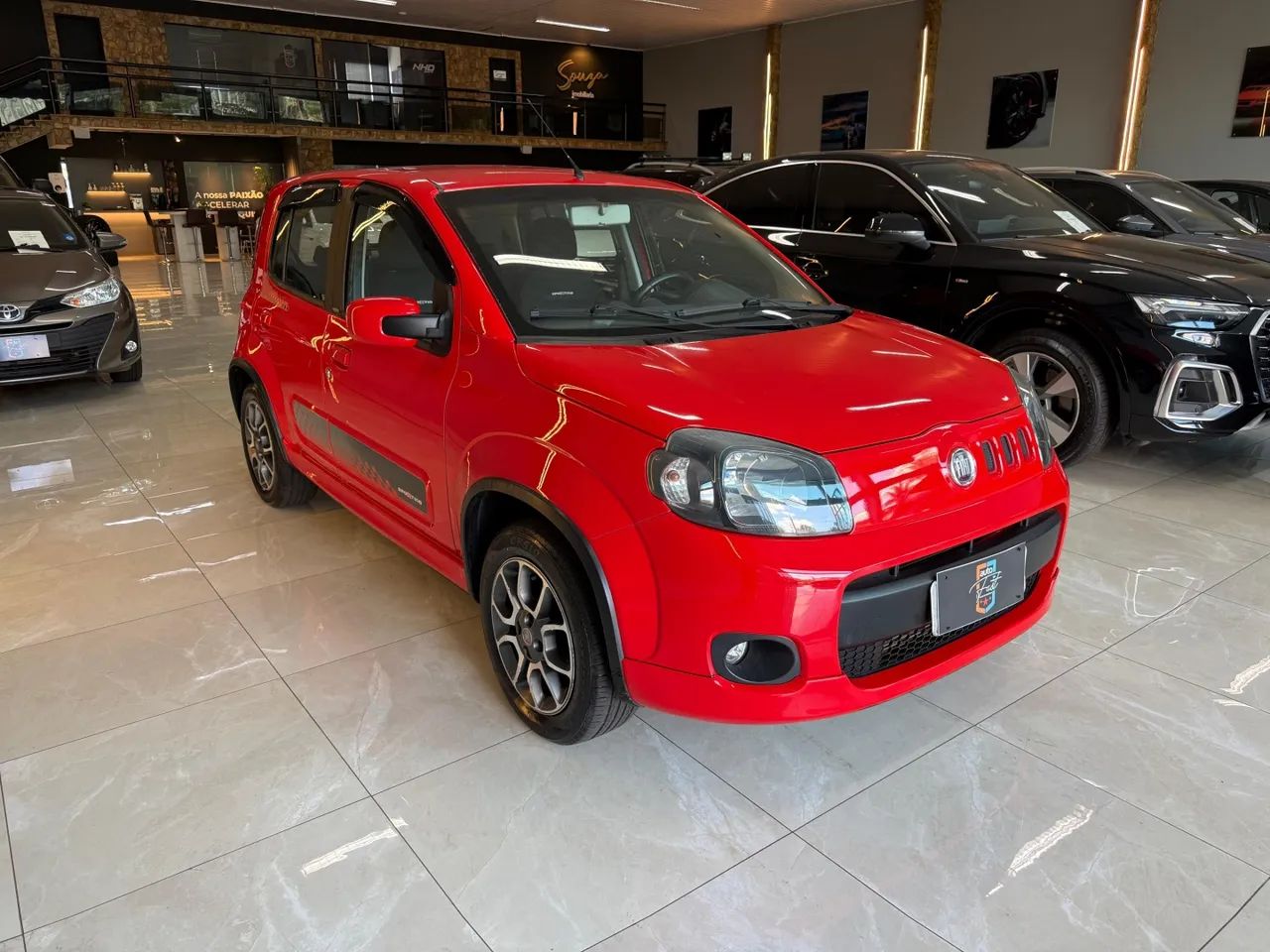 Fiat Uno Sporting 1.4 EVO Fire Flex 8V 4P 2013 - Foto 2
