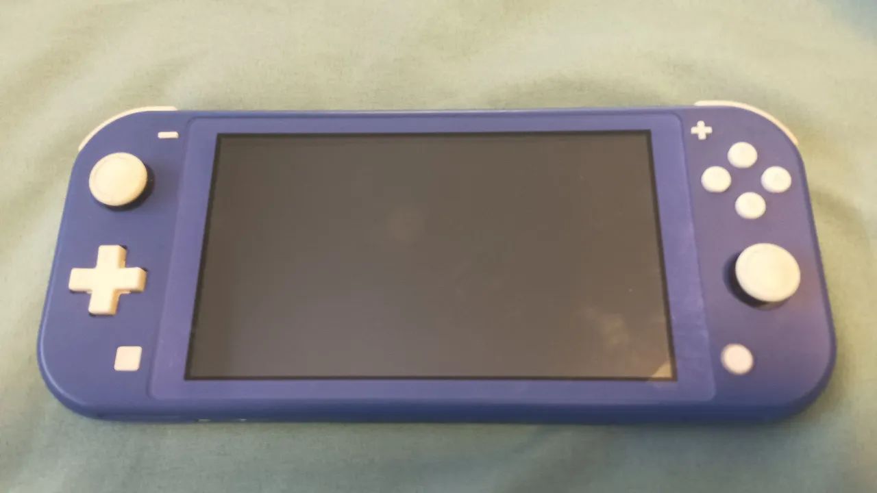 nintendo switch lite - Consoles de Vídeo Game - Família Andrade