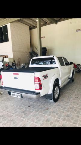Hilux SRV 2012 com controle de tração, bancos elétricos e roda 17 original - Foto 6