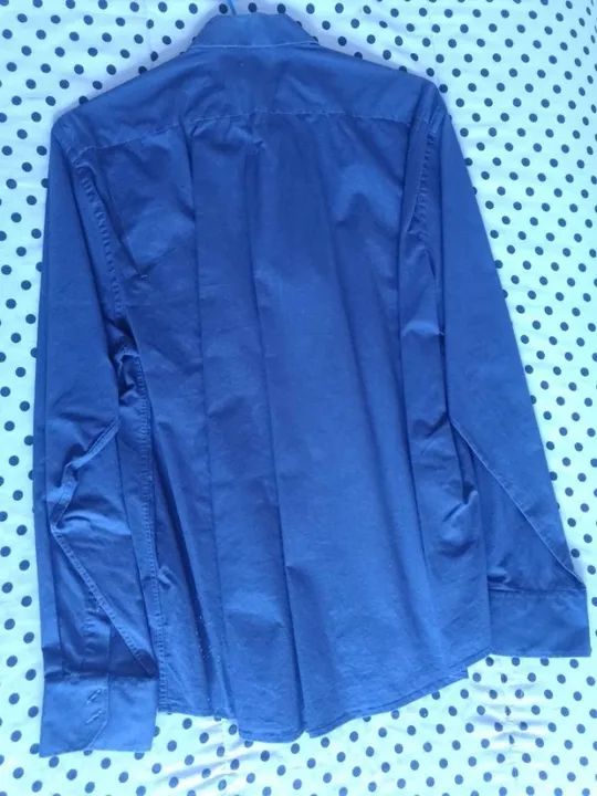 Camisa social masculino nova em perfeitas condições.