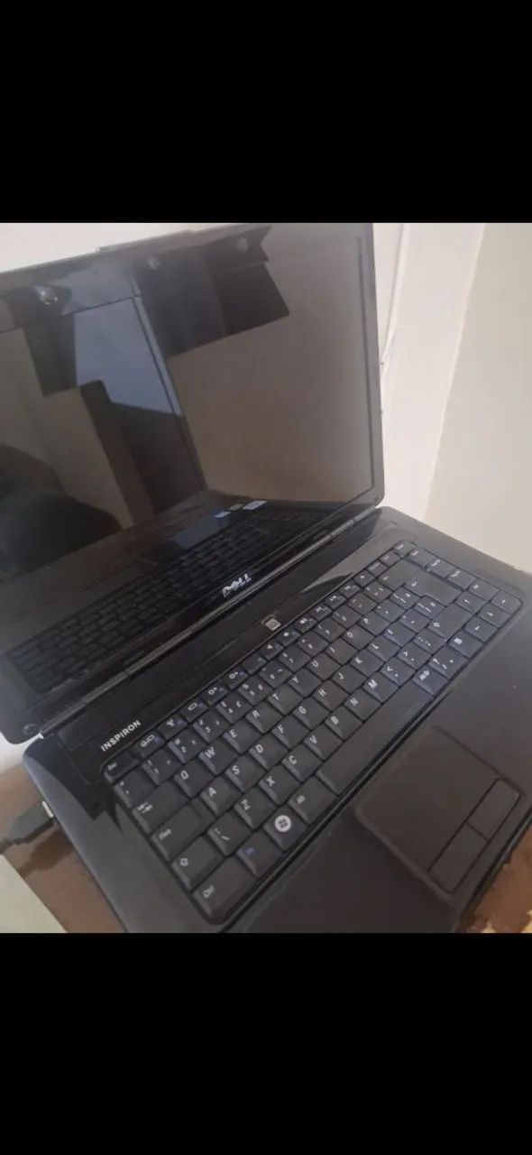 Notebook DELL (Bateria viciada) Funcionando normal.