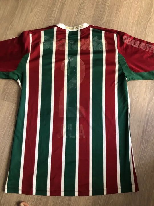 CAMISA FLUMINENSE COM COLA DO ADESIVO QUE DESCOLOU  TAMANHO P - Foto 3