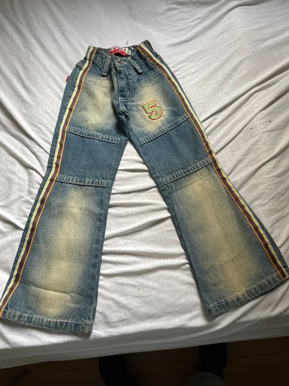 Calça jeans TAM 8 arco-íris 