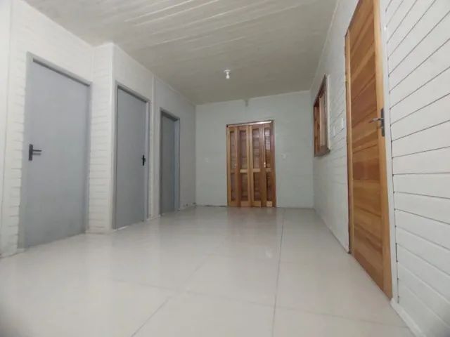 Casa 2 suítes com churrasqueira e pátio