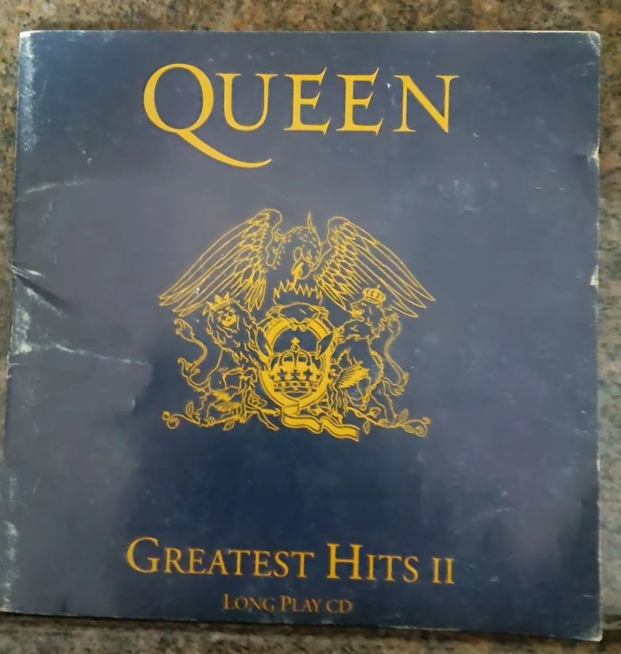 Encarte Porã CD da Banda Queen.