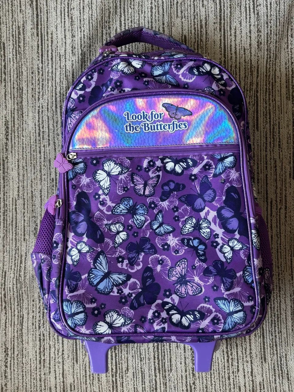 MOCHILA DE RODINHAS ROXA BORBOLETA