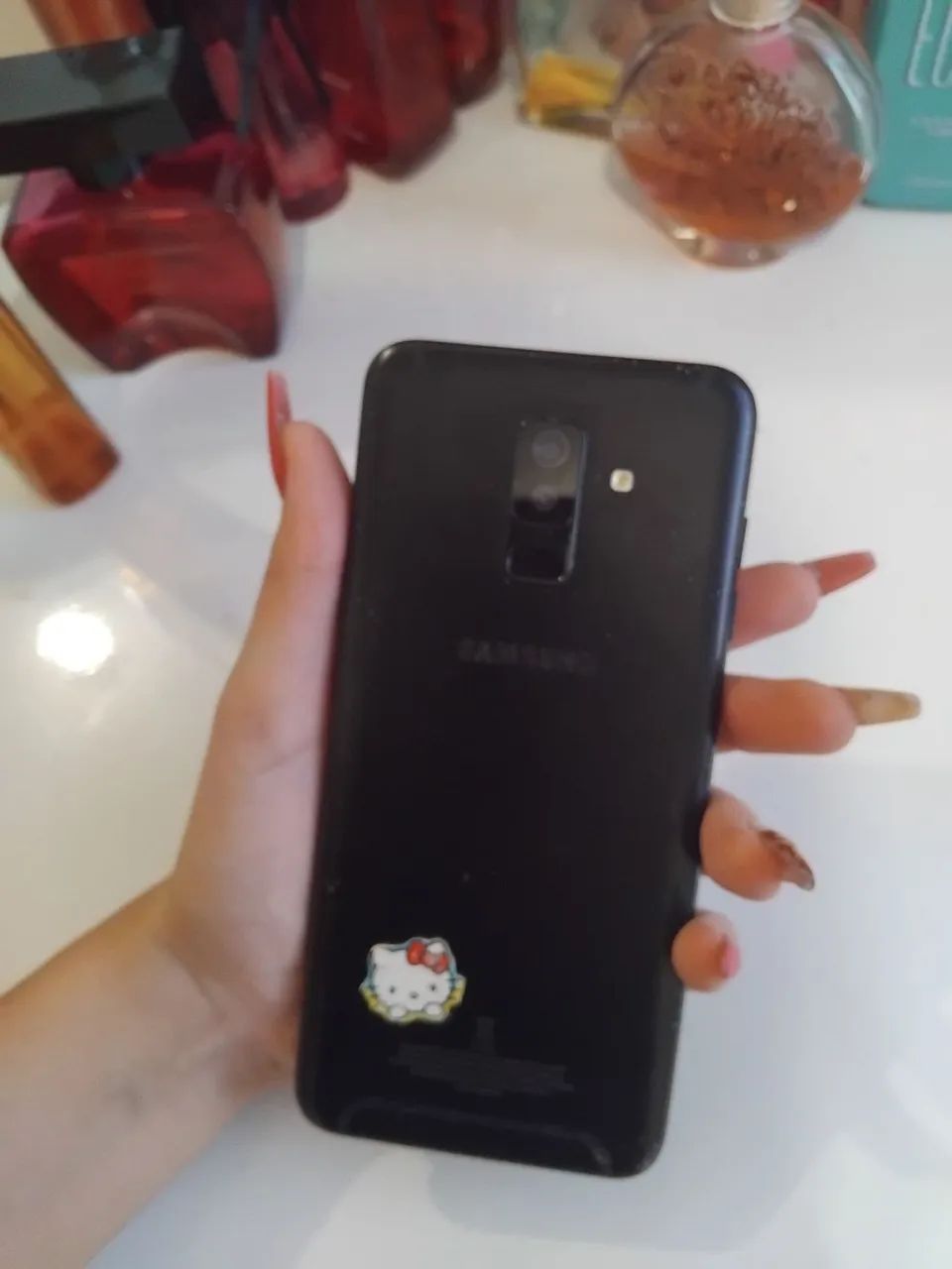 Celular com bateria estufada