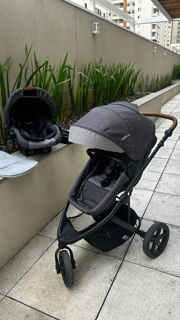 Carrinho de bebê + bebê conforto kiddo  - Foto 4