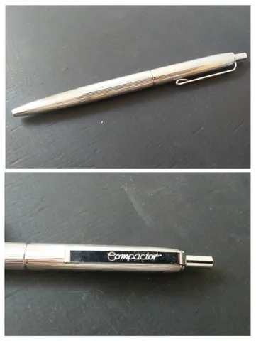 Caneta esferográfica Compactor de metal, cromada e antiga. Favor ler a descrição.