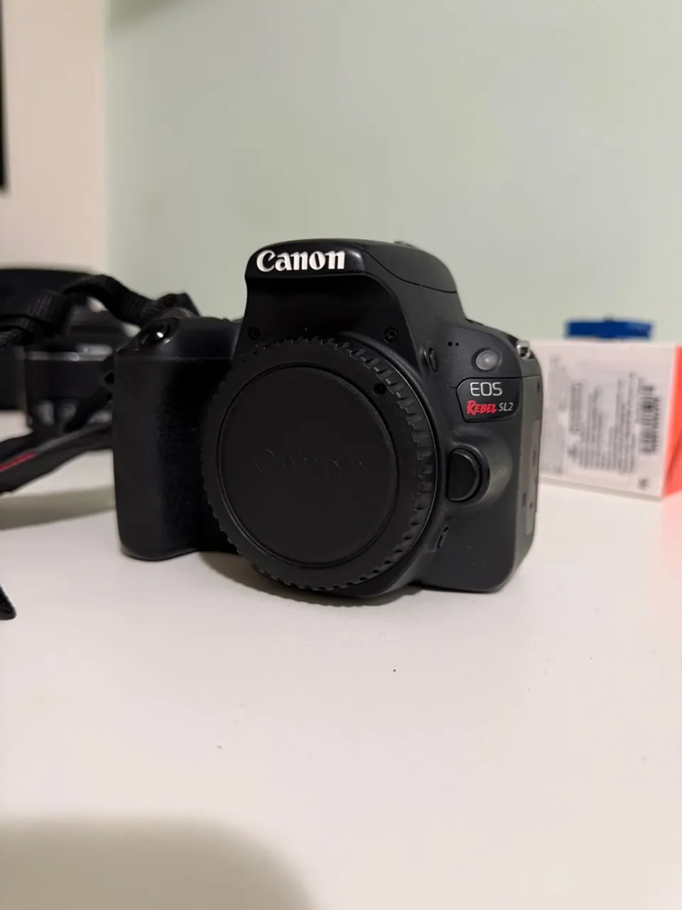 Câmera Canon SL2 + 3 lentes + flash + tripé