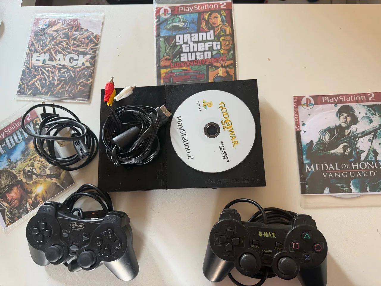 Ps2 Slim com jogos pouco uso 