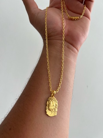 Cordão Cartier com pingente de Jesus 