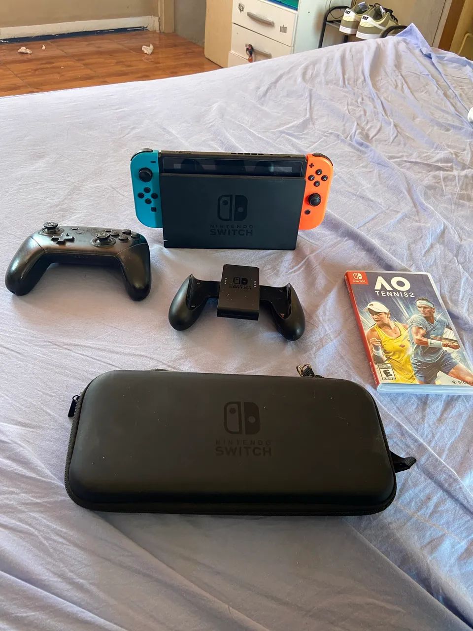 Nintendo Switch v2 BLOQUEADO + Pro Controller, jogo e case de transporte