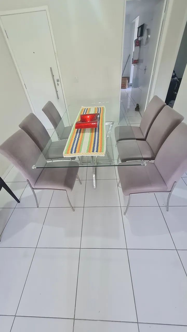 Mesa retangular de vidro,suporte inox com seis cadeiras de tecido eveludado