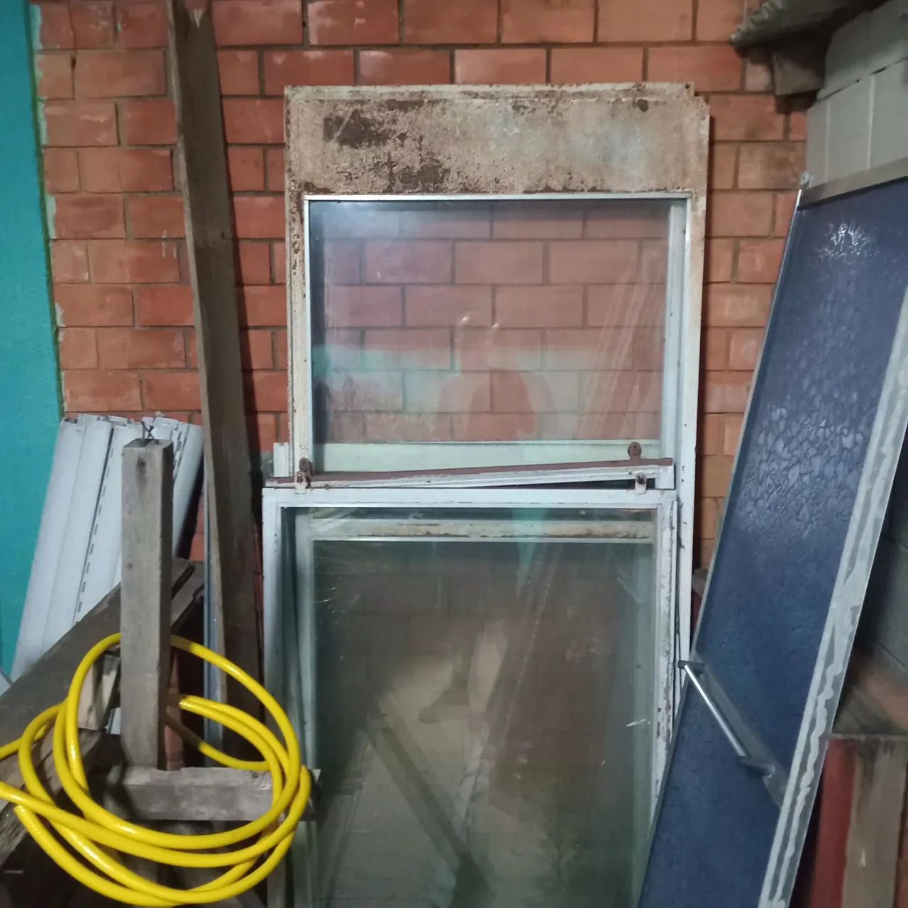 Two iron doors and two iron windows with glass